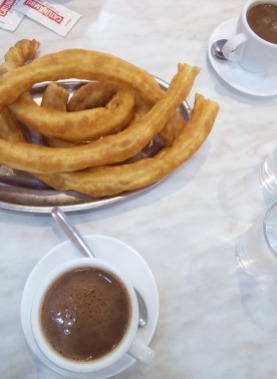 The churros were huge, and the chocolate was pudding-y.